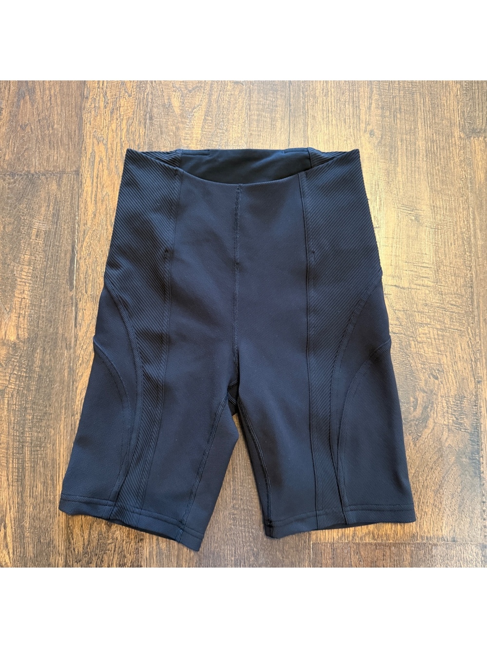 Lululemon Women's High-Rise Black Biker Shorts Size 4 with Ribbed Side Panels